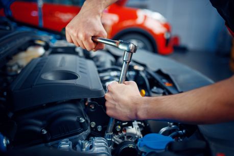 AEM Group fixing a car